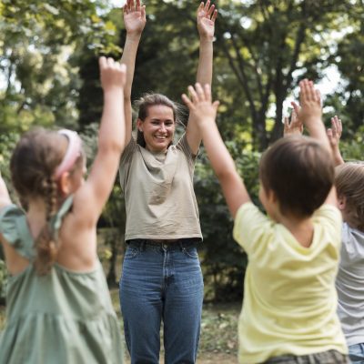 teacher-kids-exercising-outdoors